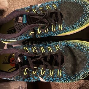 Nike Black and Teal Sneakers with Yellow Highlights